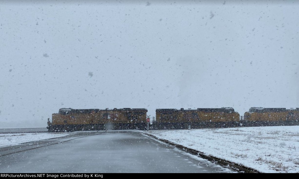 UP 7635 Leads A Manifest in the snow at Taylor, Texas - January 10, 2021